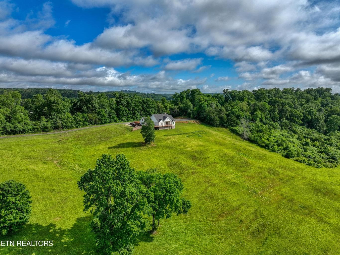 East Tennessee home with rolling green hills